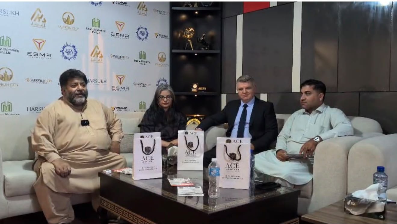 Agents' Conference at Milano Marketing Islamabad — ACE delegation seated with partners, ACE gift bags on table
