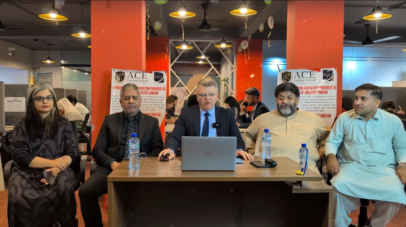 Agents' Conference at Milano Marketing Islamabad — ACE Principal presenting at table with five delegates, ACE and ASIC banners